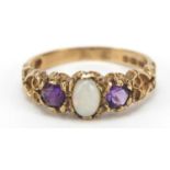 9ct gold opal and amethyst ring with scrolled shoulders, size L, 2.4g