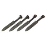 Four German military interest scabbards, each 16.5cm in length excluding the leather mounts