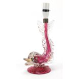 Murano gold flecked ruby glass dolphin lamp, 34cm high