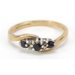 9ct gold sapphire and diamond crossover ring, size M, 1.9g