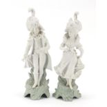 Pair of 19th century bisque figures, the largest 33.5cm high