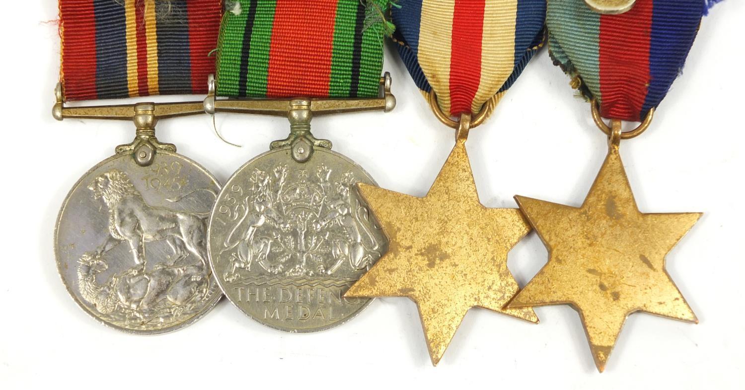 British military World War II four medal group and a side cap - Image 3 of 10