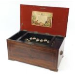 Large Swiss twelve air inlaid rosewood music box having a 33 inch brass cylinder and six bells, 33cm