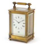 Dent of London, brass cased carriage clock with bevelled glass and dial having Arabic numerals, 11.