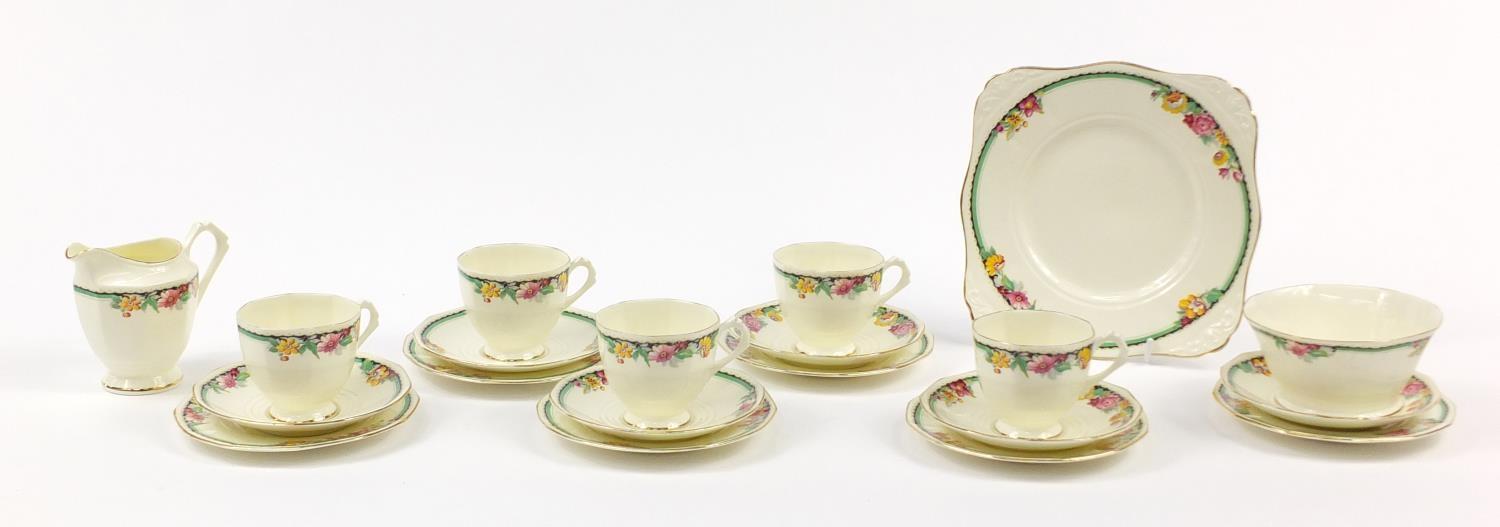 Tuscan teaware decorated with flowers including trios, each cup 7cm high