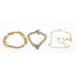 Gentlemen's gold plated Figaro link bracelet, bracelet with rolled gold love heart padlock and a