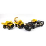 Four large Tonka tinplate vehicles and a smaller example including car transporter and dump truck,