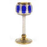 Attributed to Moser, Bohemian blue overlaid wine goblet gilded with foliage, 19cm high