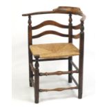 Antique elm corner chair with rush seat, 78cm high