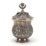 Persian silver coloured metal baluster cup with hinged lid embossed with flowers and foliage, 13cm