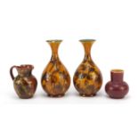 Linthorpe, Arts & Crafts Pottery in the manneer of Christopher Dresser comprising a pair of vases,