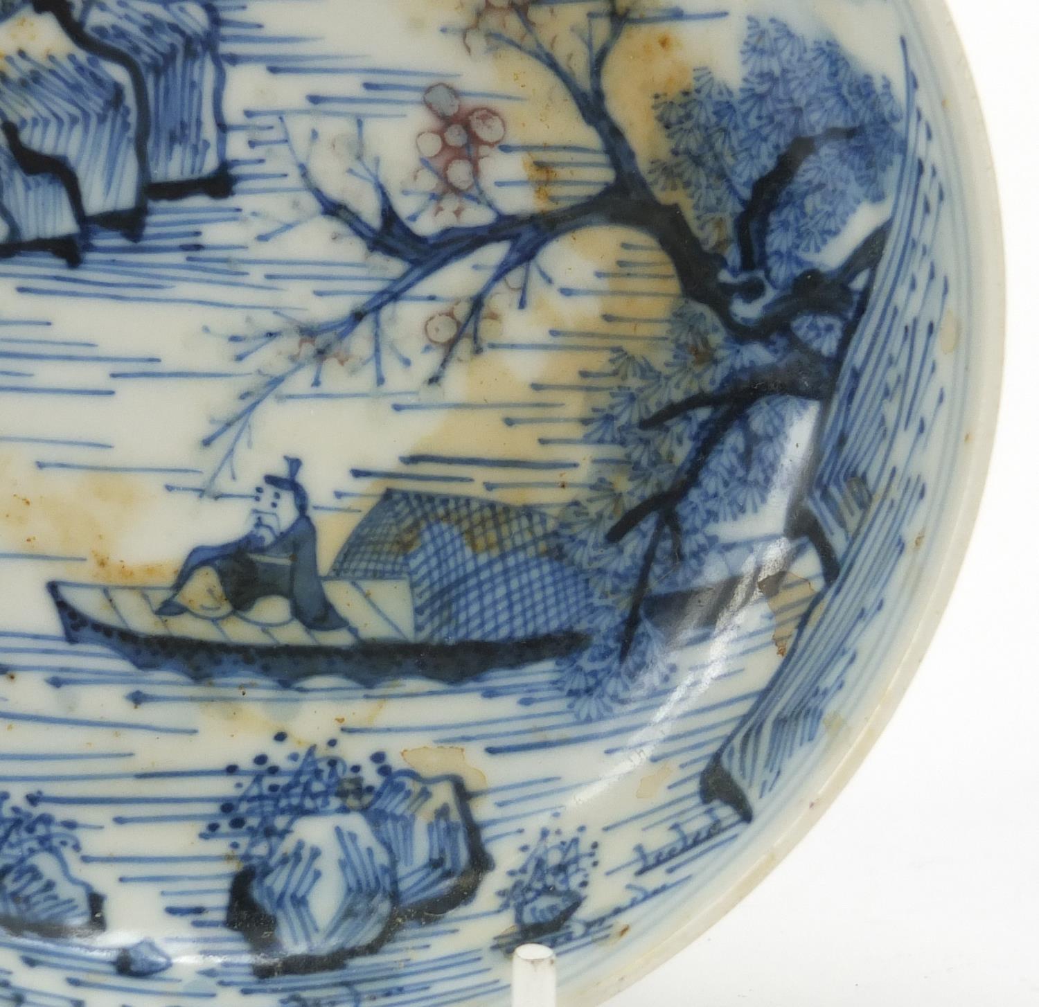 Chinese blue and white porcelain shallow dish hand painted with fishermen in a mountain landscape, - Image 3 of 6