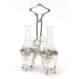 WMF, German Art Nouveau silver plated cruet stand housing two glass bottles etched with flowers,