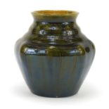Christopher Dresser for Linthorpe Pottery, Arts & Crafts pottery vase having a green glaze and