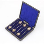 William Hutton & Sons Ltd, set of six George V silver coffee bean spoons housed in a velvet and silk