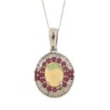 9ct white gold opal, diamond and ruby pendant on a 9ct white gold necklace, the pendant 2.2cm