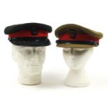 Two British military Senior Officer's peaked caps, one with A J White Ltd maker's stamp to the