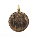 9ct gold St Christopher pendant, 1.9cm in diameter, 2.0g