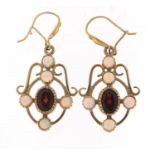 Pair of unmarked gold garnet and opal drop earrings, 3.5cm high, 4.2g