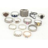 Fourteen silver and white metal rings, some set with semi precious stones, various sizes, 65.0g