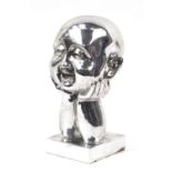 Silvered bust of happy Buddha with head in hands, 29cm high