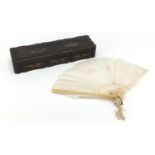 Chinese Canton ivory brisé fan with lacquered box gilded with figures, the fan 28cm in length when