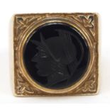 9ct gold and black onyx intaglio seal ring carved with a gladiator's head, size N, 8.5g