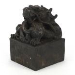 Large Chinese patinated bronze dragon seal, character marks to the base, 13cm high