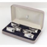 Ari D Norman, set of six oval silver napkin rings, housed in a fitted box, London 1993, each 5.2cm