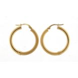 Pair of 9ct gold hoop earrings, 2.6cm in diameter, 2.2g
