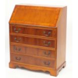 Yew bureau fitted with a fall with fitted interior above four drawers, 95cm H x 75cm W x 41.5cm D