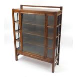 Manner of Liberty & Co, Arts & Crafts oak glazed display cabinet with three shelves, 139cm H x 109cm