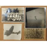 Two albums of black and white postcards including military examples