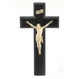 19th century carved ivory Corpus Christi on ebonised crucifix, 27.5cm high