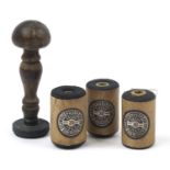 German military interest desk seal and three spools of thread with labels, the largest 12cm high