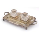 Thomas Bradbury & Sons, Edward VII silver desk stand with a pair of heavy cut glass inkwells, raised