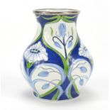 Moorcroft enamel baluster vase hand painted with stylised flowers, dated 2004, 6.5cm high