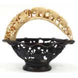 Anglo Indian basket with ivory cast handle carved with elephants and foliage, 34cm high x 39cm wide