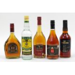 Five bottles of brandy and rum including Soberano, Wray & Nephew, E & J and Reverie