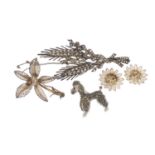 Three silver brooches and a pair of filigree silver earrings, the largest 8cm in length, 30.3g