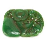 Large Chinese green jade panel carved with flowers, 10.5cm wide