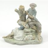 Large Lladro figure group of two lovers eating grapes beside a tree, 27cm high