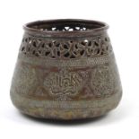 Islamic copper pot with pierced band engraved with calligraphy and flowers, 10.5cm high