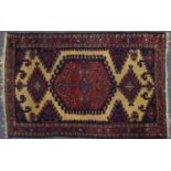 Rectangular Persian rug having all over floral and geometric design, 168cm x 109cm