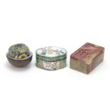 Chinese carved stone box and cover and two enamel boxes with covers, the largest 11.5cm wide