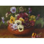 Still life flowers in a vase, Continental school oil on canvas, bearing an indistinct signature,