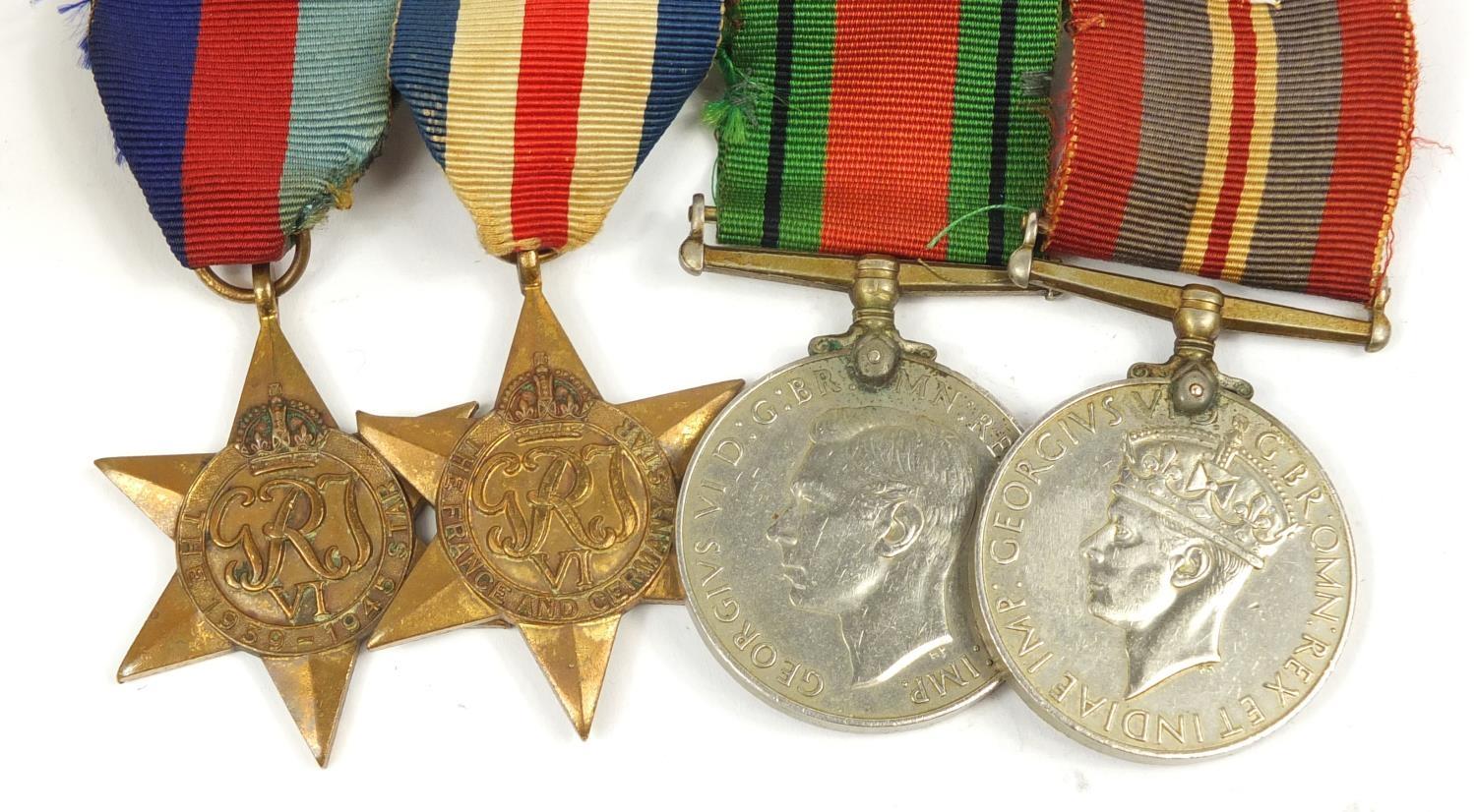 British military World War II four medal group and a side cap - Image 2 of 10