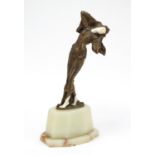 Large French Art Deco bronze and ivory figurine of a scantily dressed female, raised on a shaped