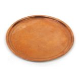 The Birmingham Guild Ltd, Arts & Crafts circular copper tray, impressed marks to the reverse, 38cm
