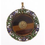 Chinese silver gilt, enamel and tiger's eye pendant, 3.5cm in diameter, 8.2g